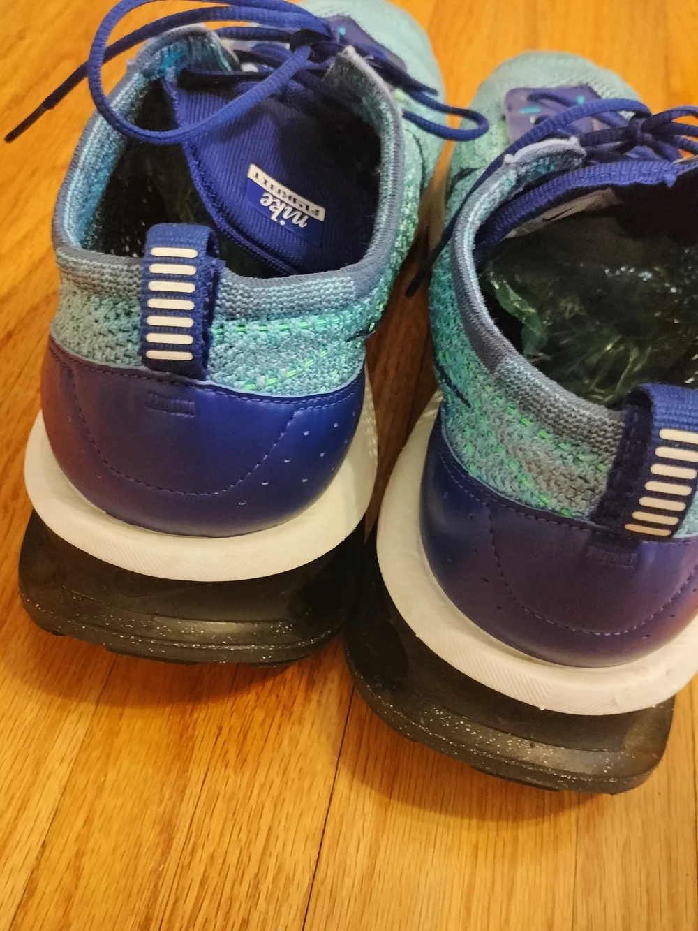 Nike Men's Air Max Flyknit Racer Sneakers. Royal Blue/Algae. Size 13